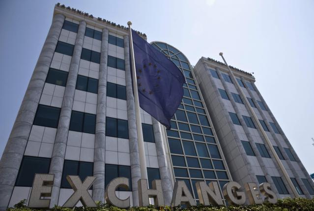 Greek stock market opens 23 percent down after five-week shutdown
