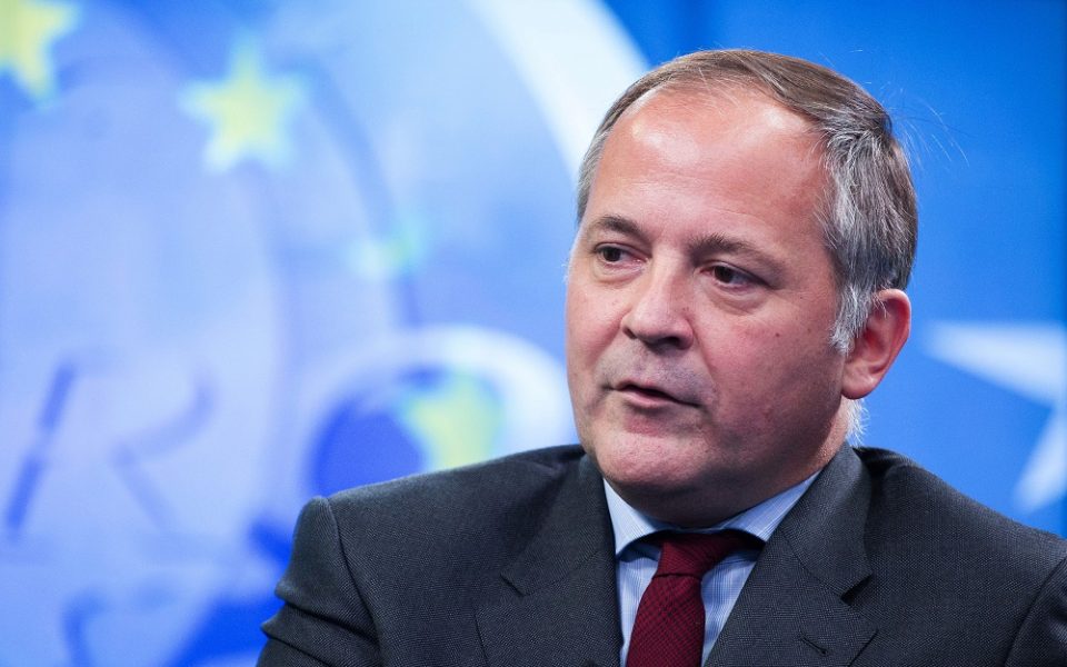 Coeure says ECB could reinstate Greek bank waiver before October