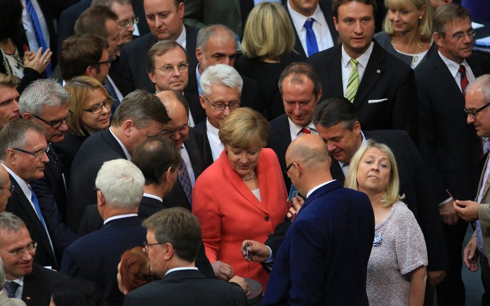 Merkel allies warily back Greece deal as parliament vote is set