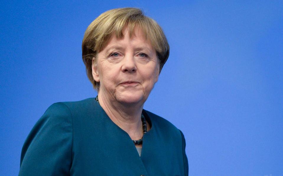 Merkel flags debt relief for Greece in bid for IMF participation