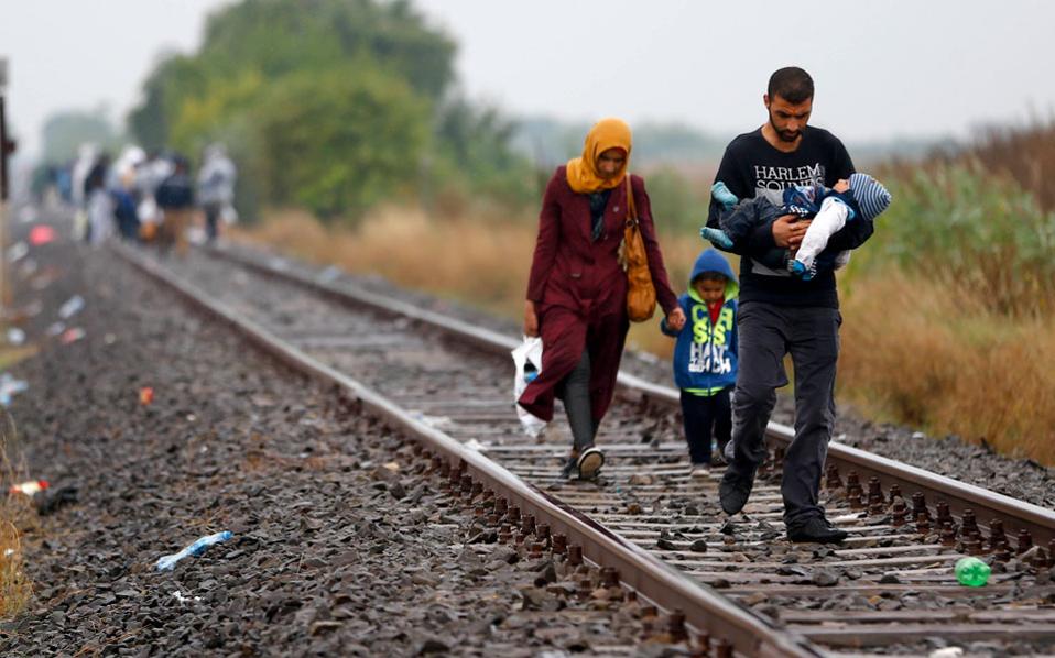 Migrants undeterred by Balkan storms and Hungarian clampdown