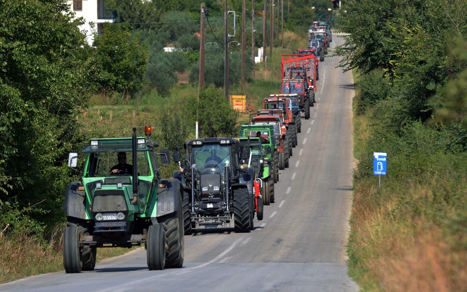 Greek farmers rev up tractors for tax protests