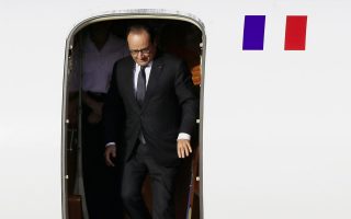 French president visits Athens as Greece seeks debt relief
