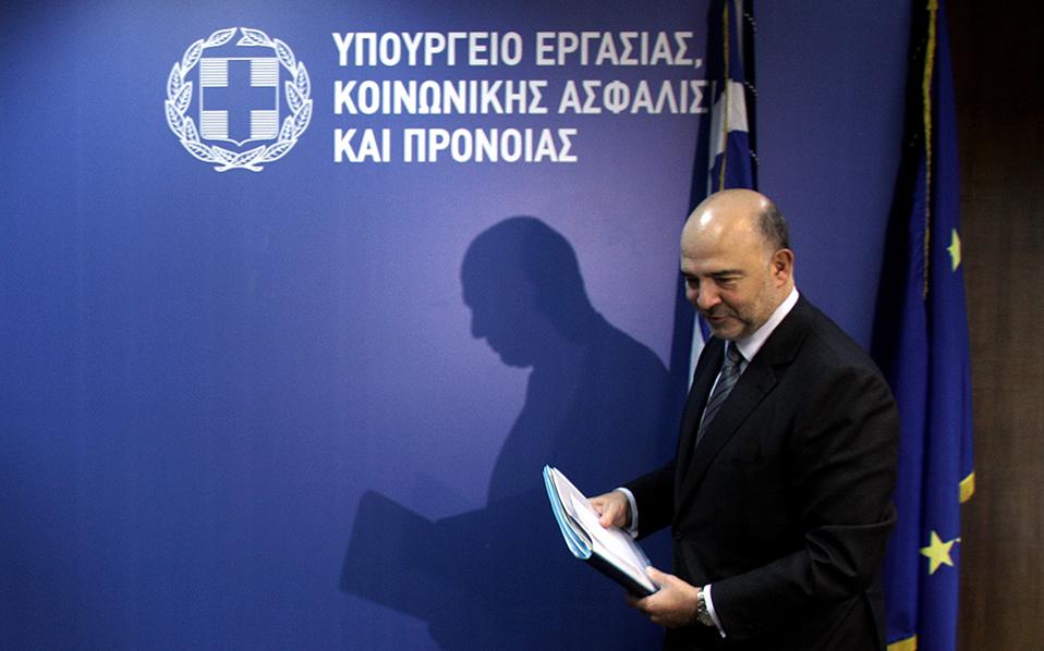 No let-up on Greek reforms because of migrants, Moscovici says