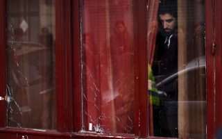 Syrian passport at Paris attack scene belonged to asylum seeker, minister says