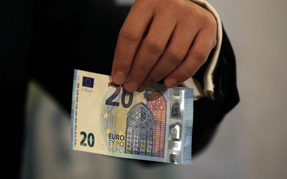 BoG chief Stournaras unveils new 20 euro note