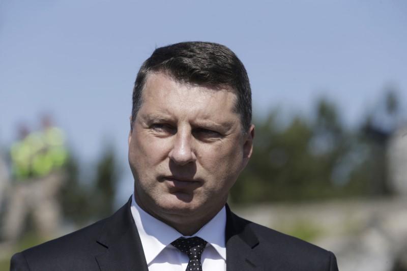 Latvia urges Greece to tighten border to ease refugee crisis