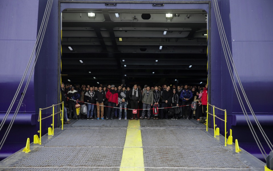 Refugees arrive at Piraeus port
