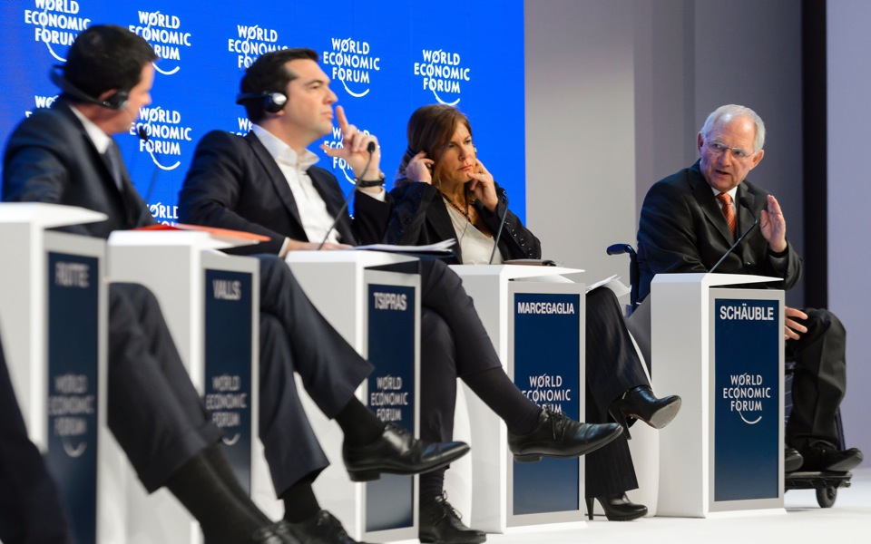 Davos: Tsipras, Schaeuble discuss IMF involvement in Greek bailout