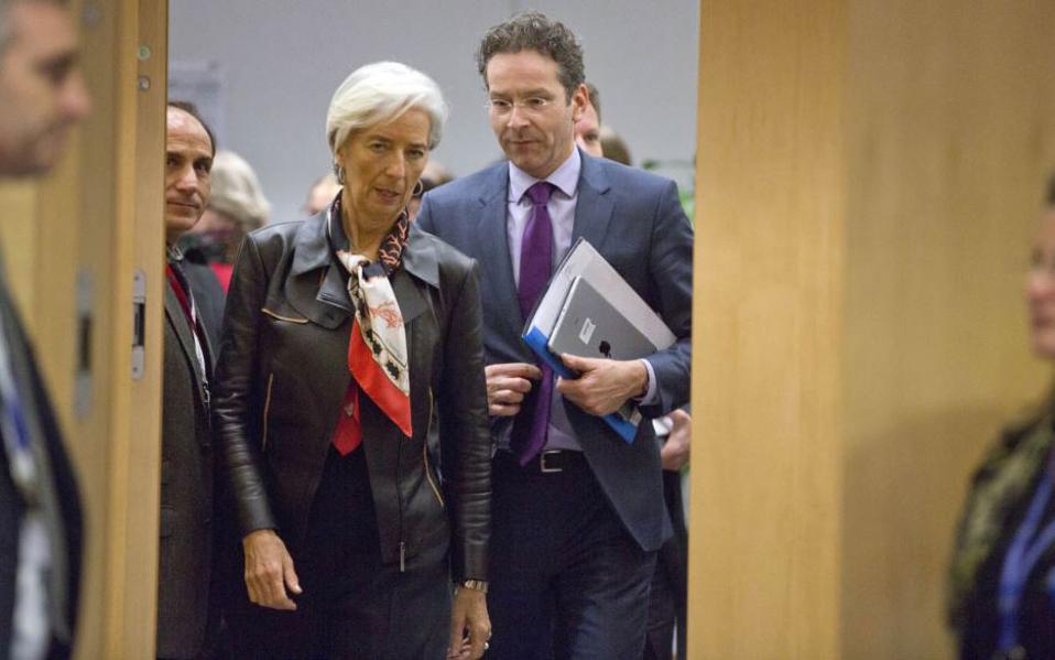 Eurogroup chief says Greek bailout not heading for crisis, insists on IMF role