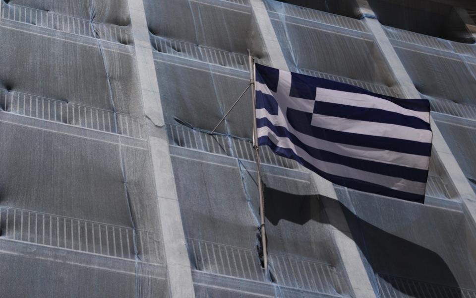 Greece contemplates extra measures but hopes primary surplus will help its cause
