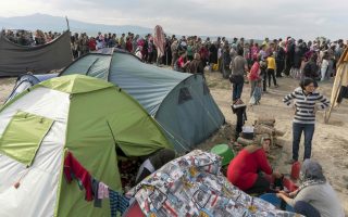 Refugee hit by police car in Greek camp dies