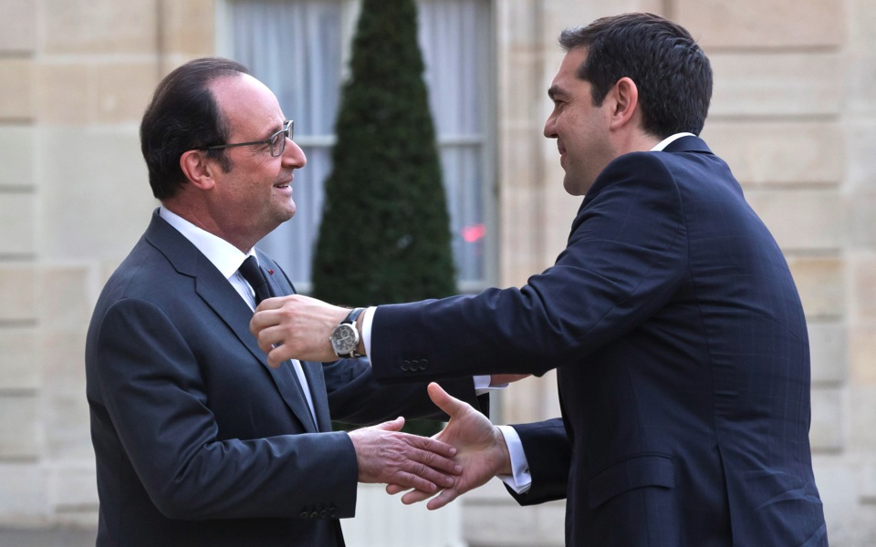 Tsipras, Hollande agree Greek review should be finished quickly