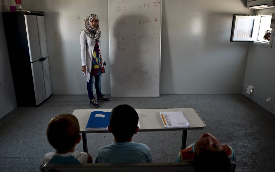 No summer break for migrant schoolchildren in Greek camp