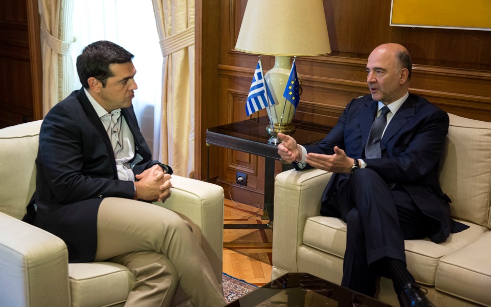 Moscovici urges Greece to stick to bailout reforms