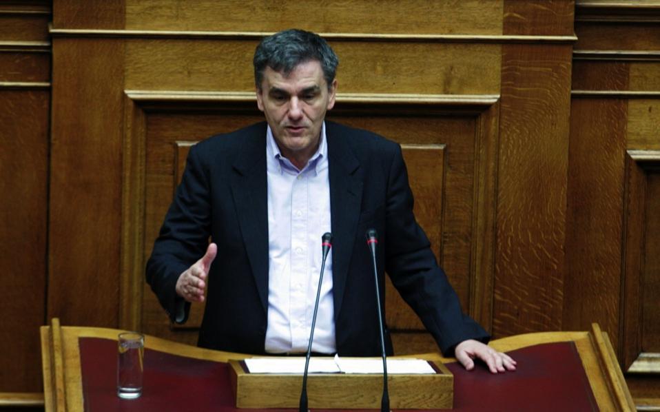 Tsakalotos suggests no medium-term plan until review is completed