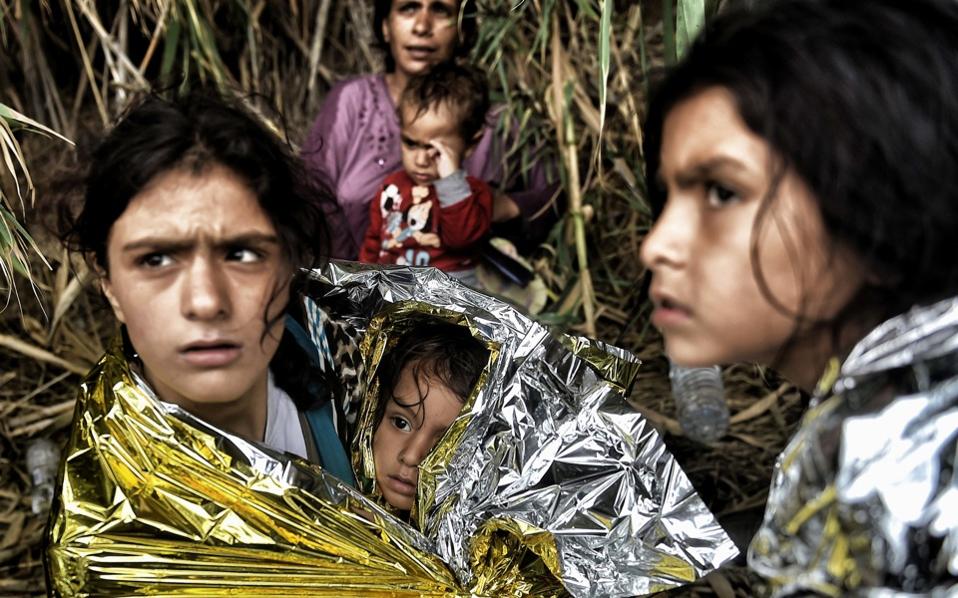 Greek photographer who brought migrant crisis home wins prestigious award