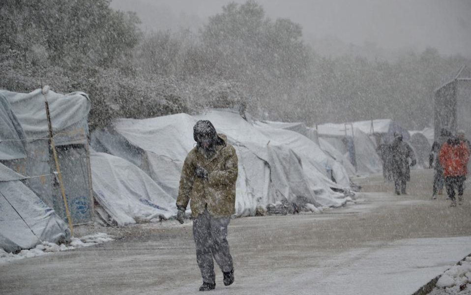 Greece sends navy ship to help freezing migrants