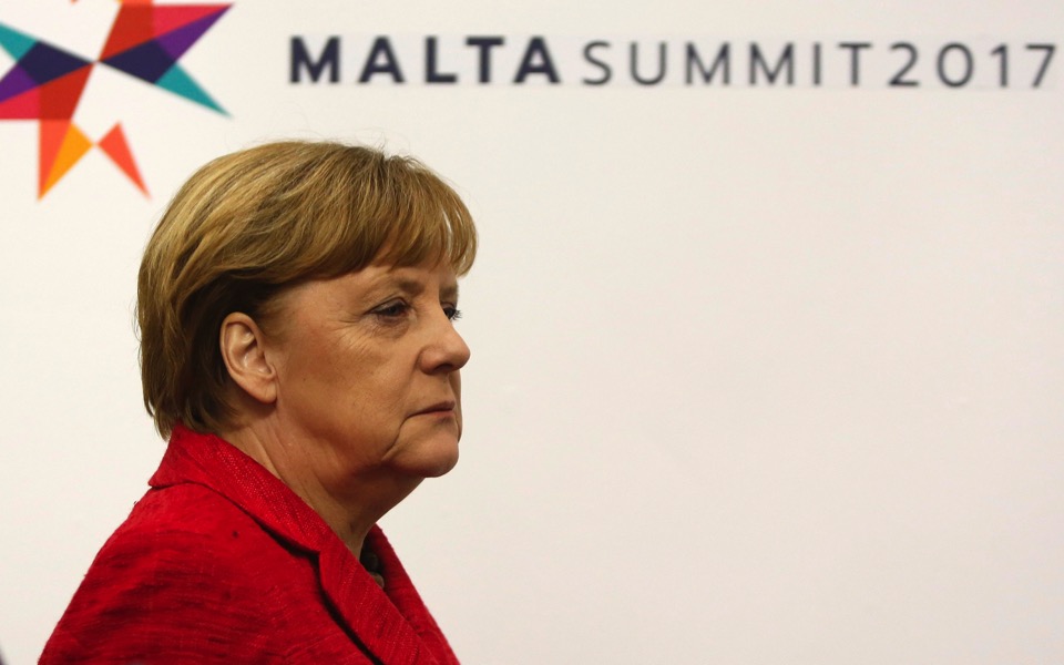 Merkel stops talk of political solution to review