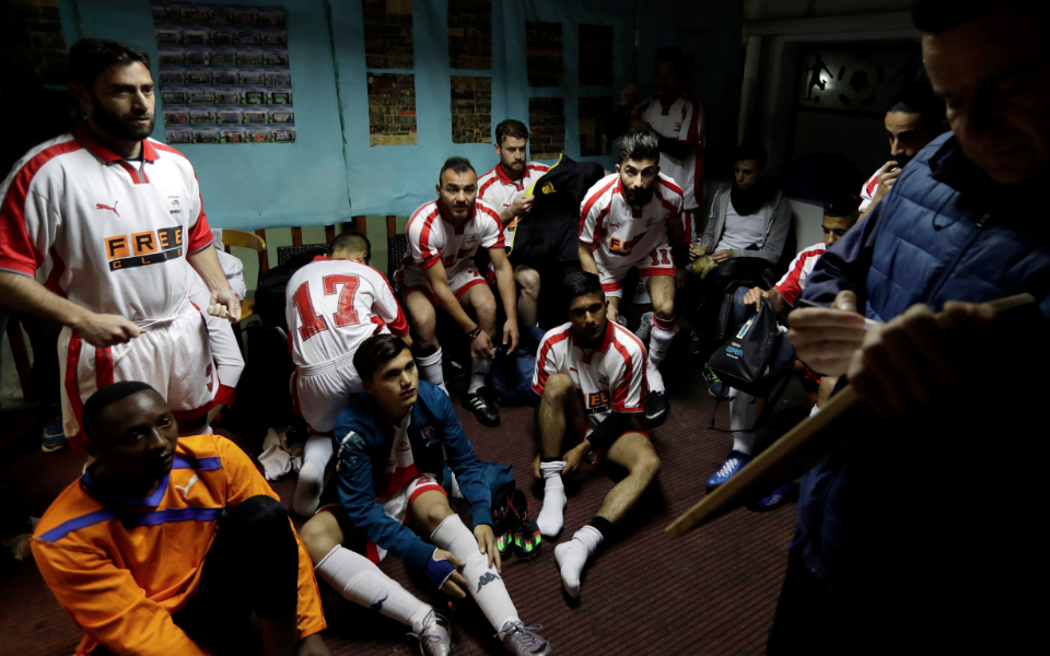 Greek soccer hero helps refugees win battle against boredom