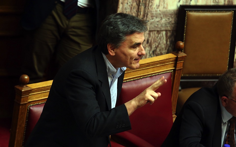 Tsakalotos keeps cards close to chest on deal