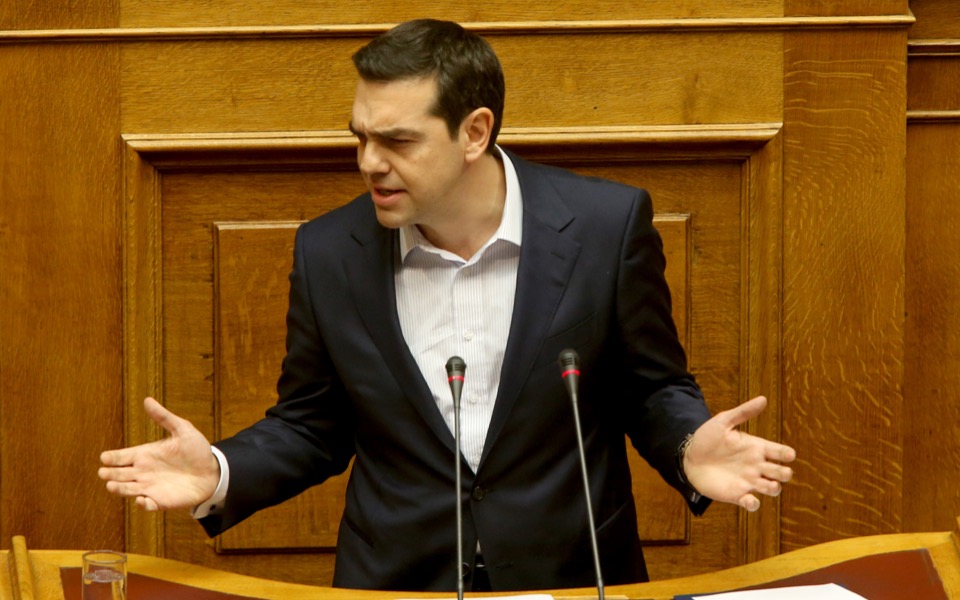 Tsipras tries to put the lid on gloom, blames IMF for delay