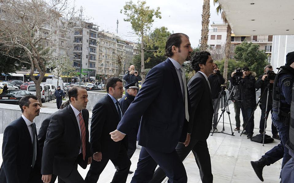 Greek court says Turkish servicemen must stay in custody