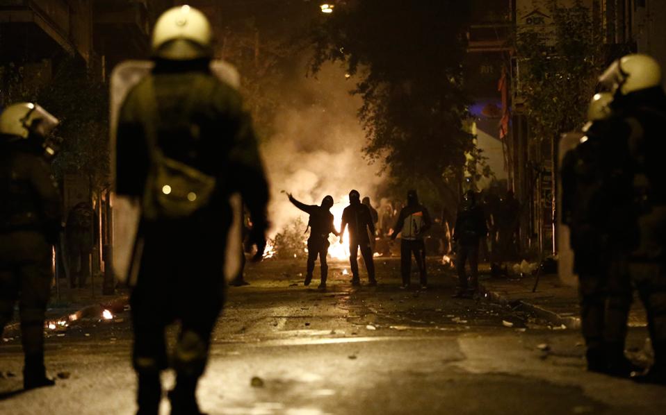 Riot police come under firebomb attacks
