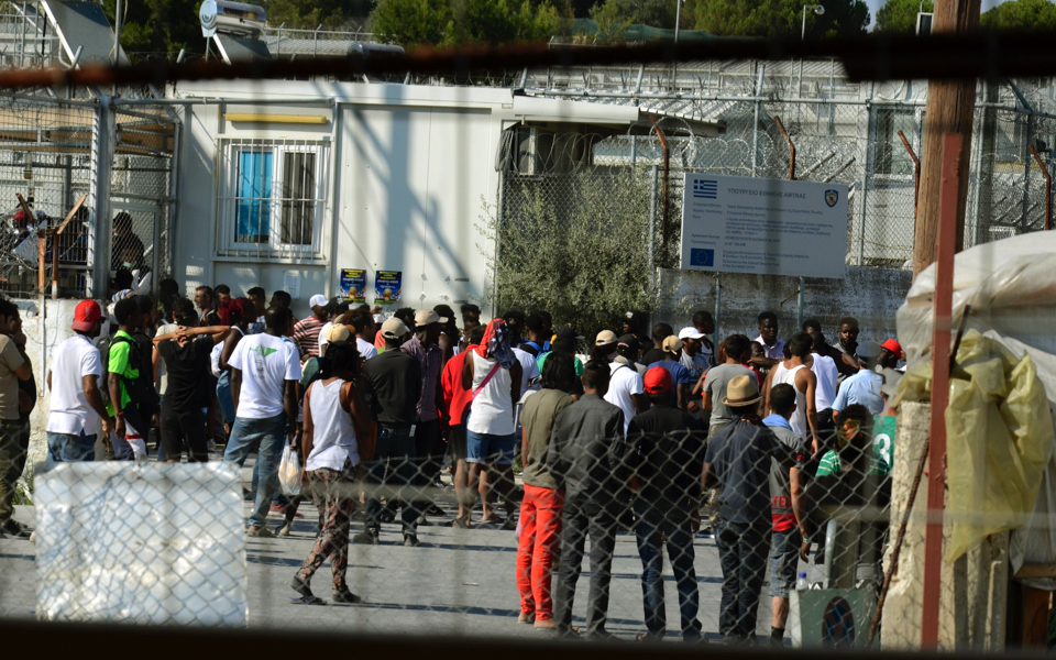 Amid new spike in arrivals, overcrowded migrant centers become more tense
