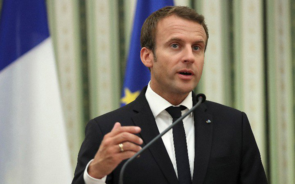 Macron, in Athens, pushes vision of deeper eurozone integration, praises Greece