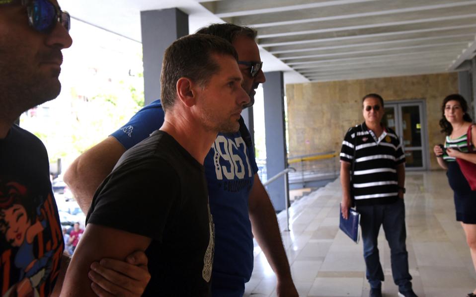 Bitcoin fraud suspect wanted by US, Russia appears in Greek court