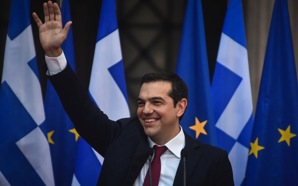 Greek PM dons tie in sartorial relief over bailout end