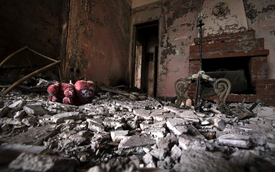 Dolls, bicycles among charred belongings from Greek blaze