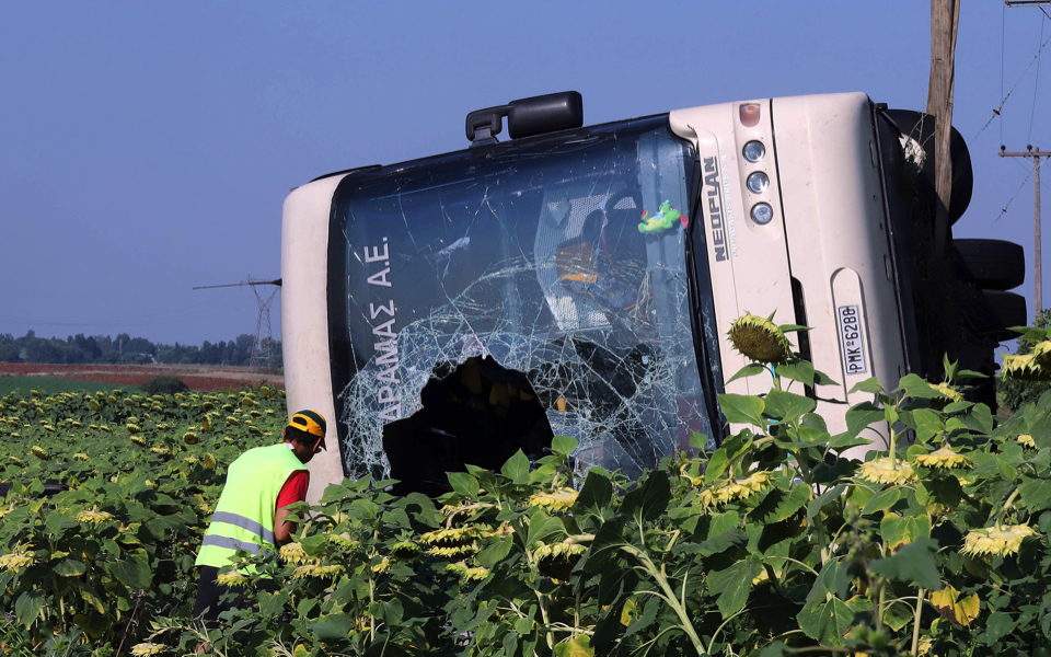 Passengers of overturned bus get away with scrapes and bruises