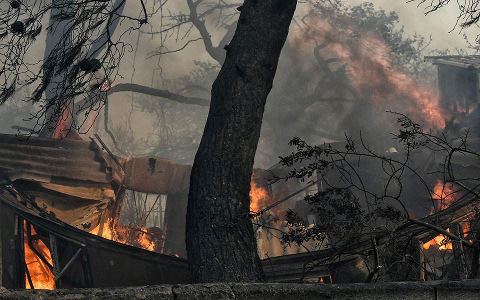 Athens wildfires: Death toll rises to 24 as huge fire sweeps through holiday resorts