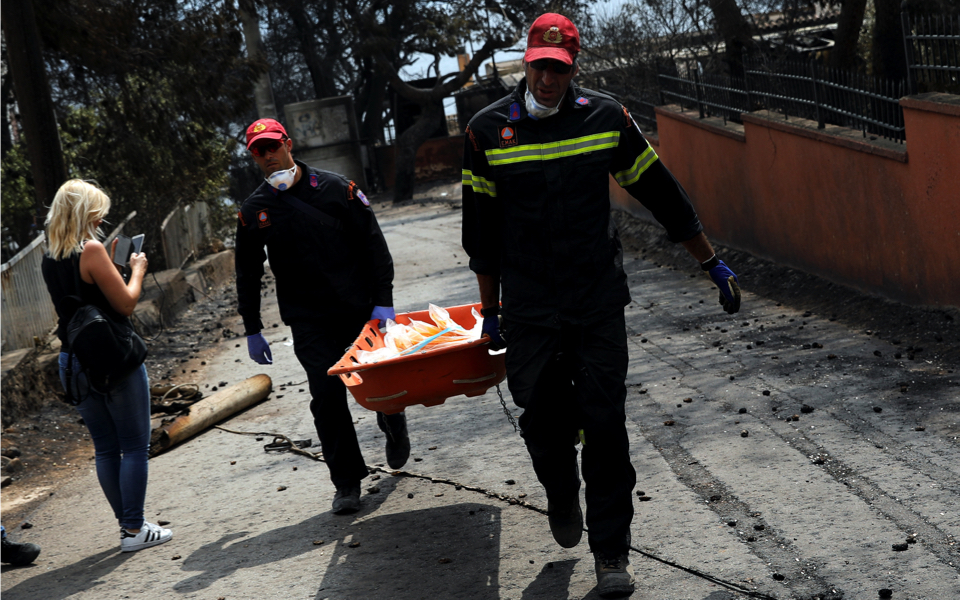 Greek fire brigade says death toll in wildfires rises to 74