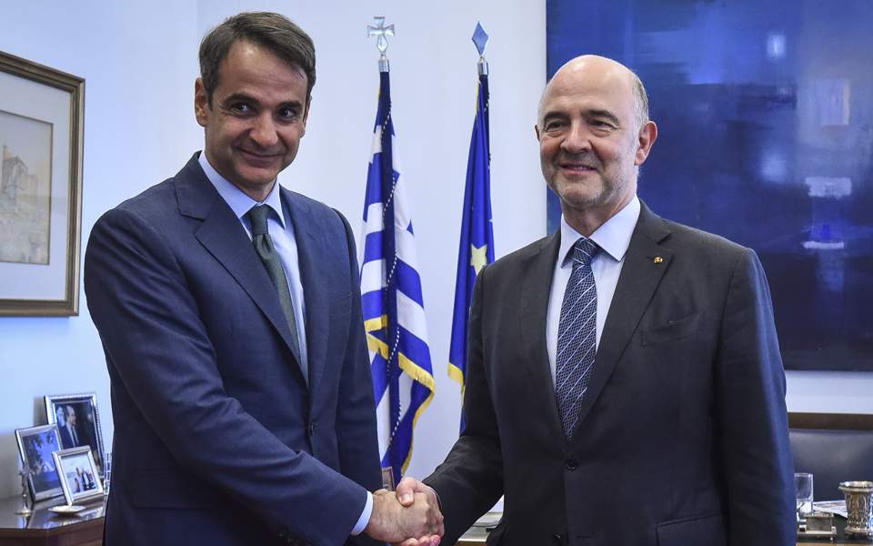 Mitsotakis cautions Moscovici on statements about Greece