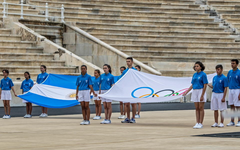 Olympic flame begins journey to Buenos Aires