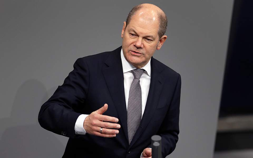 Scholz says would be a mistake for Greece to change bailout program