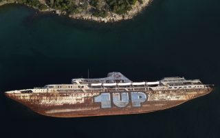 Greece hauls abandoned, half-sunken ships out of the sea