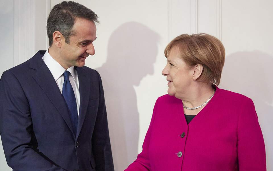 German chancellor, Greek opposition chief discuss economy, name deal