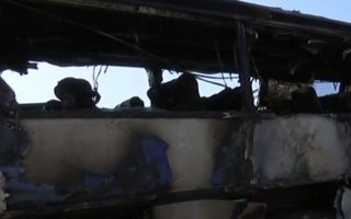 Bus destroyed in suspected arson attack in downtown Athens