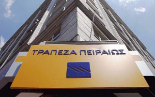 Greece’s Piraeus bank profits fall in first quarter