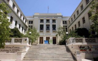 six-arrested-trying-to-take-down-wall-in-athens-university