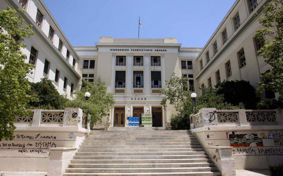 Six arrested trying to take down wall in Athens university