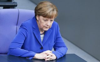 Merkel insists on high primary surplus targets