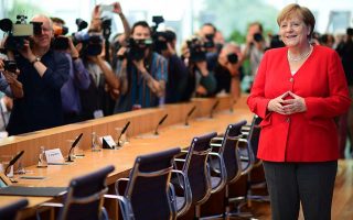 Merkel offers budget target hope