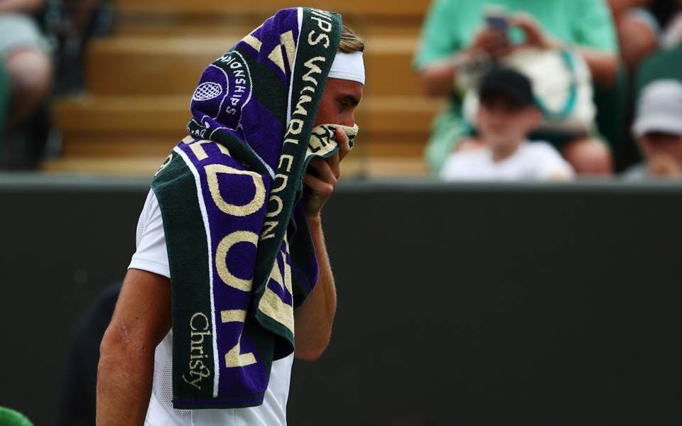 Tsitsipas crashes out of Wimbledon