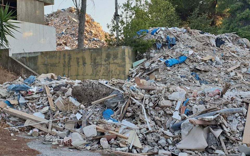 Four arrested for dumping debris at illegal landfill