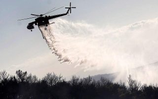 Firefighters battle new flare-ups in Crete